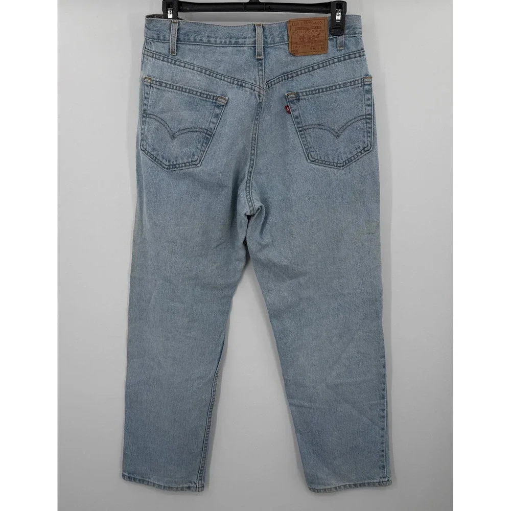Vintage Levis 550 Relaxed Fit Tapered Leg Light Wash Jeans Made in USA 36x30